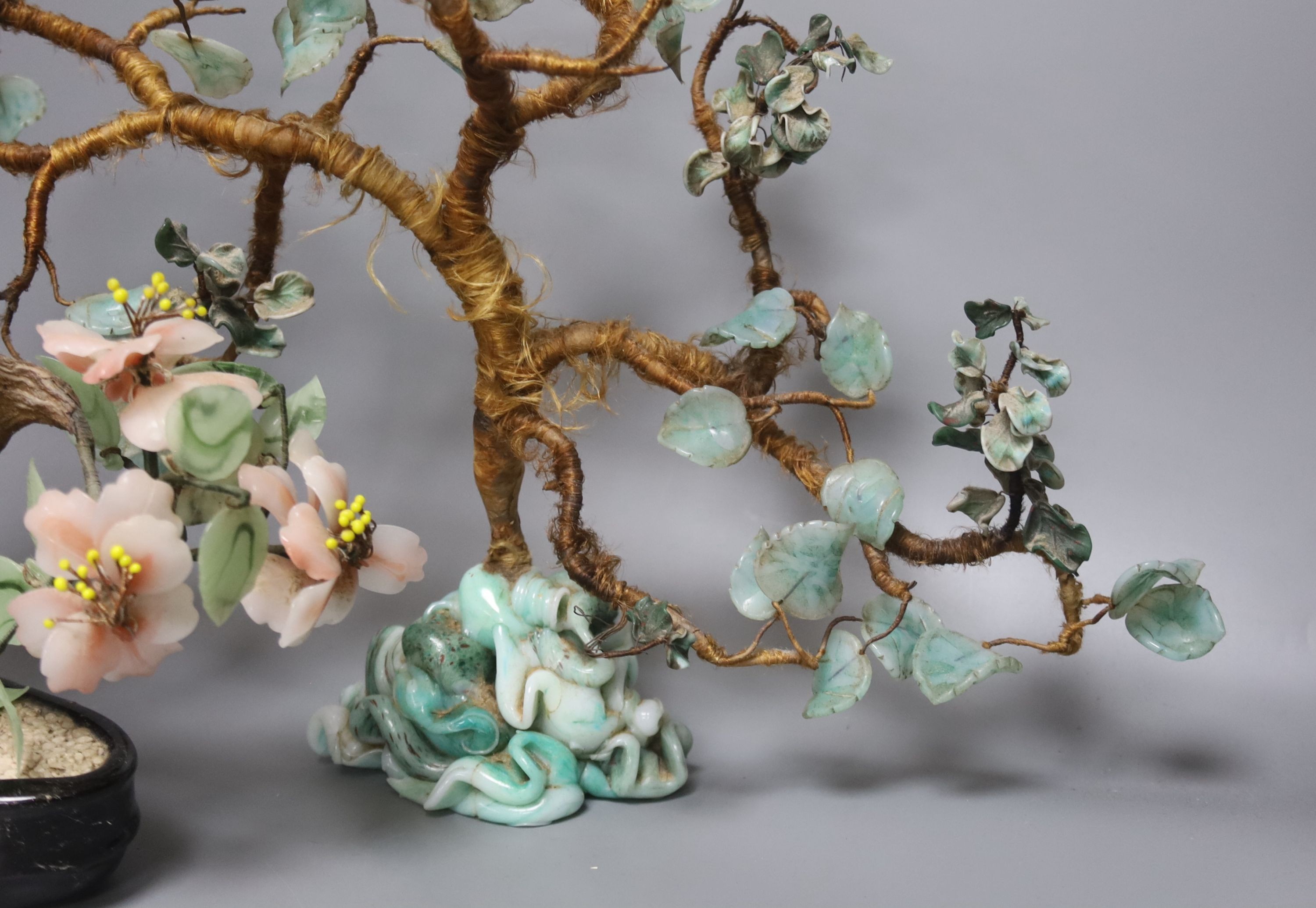 A pair of Chinese glass models of trees, tallest 29 cm